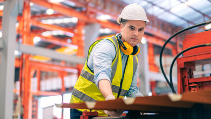 Smart professional Caucasian quality control,Industrial,factory engineer,technician,worker man in safety helmet inspect steel metal sheet at machine production,manufacture worker concept in copy space