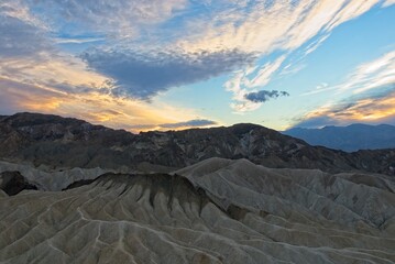 Sunset over badlands in Death Valley National Park