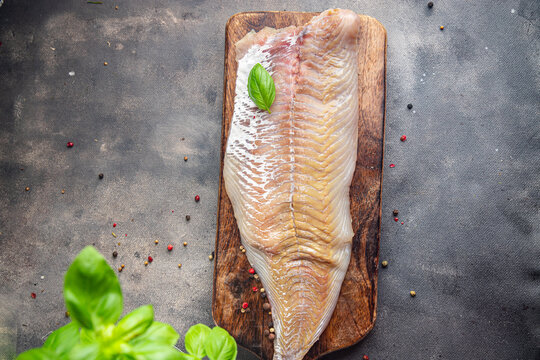 fish saithe raw seafood fillet fresh dish healthy meal food snack on the table copy space food background 