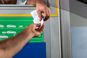 Payment of the fare on the way. Concept of new technologies in road transport and toll roads.