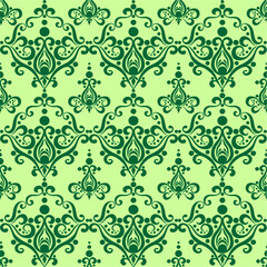symmetrical seamless ornament tile from green graphic abstract elements on olive background, texture, design