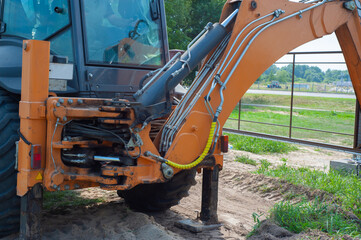 Crawler excavator digging on demolition site. Excavating machine. Earth moving equipment. Excavation vehicle.