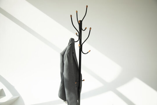 man jacket hanging on a hanger