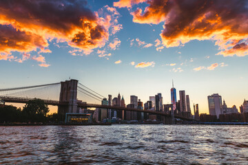 Fototapeta na wymiar New York City Skyline during the Sunset on Manhattan bridge. 
