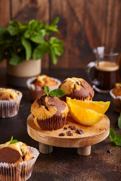Muffins with double flavors: orange and chocolate. Delicious homemade sweet dessert. 