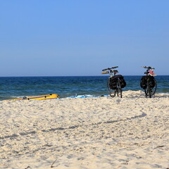 Bicycle travel to the sea, along the coast. Rest on the beach.