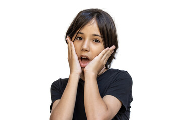 Fototapeta premium Surprised and happy young asian boy smiling with folded hands on face. Winner children boy raising hands in surprise looking at camera. Impressed child. Exciting news. black tshirt on white background