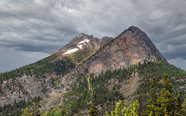 Great Rocky Mountains under magnificent clouds and sunlight, at Banff National Park, Calgary, Canada	