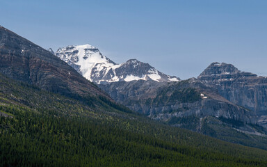 Great Rocky Mountains under magnificent clouds and sunlight, at Banff National Park, Calgary, Canada