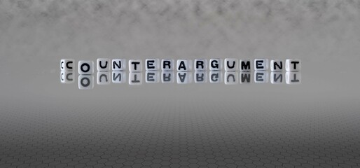 counterargument word or concept represented by black and white letter cubes on a grey horizon background stretching to infinity - obrazy, fototapety, plakaty