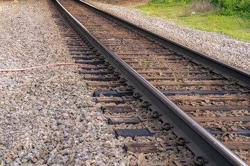 Fototapeta premium Rural train rails up-close in summer