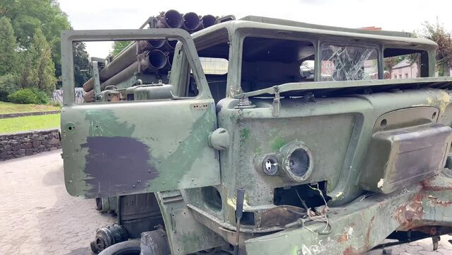 Torn cabin and destroyed body with guns of the Russian self-propelled artillery installation "Smerch". Destroyed artillery of Russian military equipment in Ukraine. Russian military equipment was neut