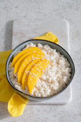 fresh ripe mango and sticky rice with coconut milk, authentic Thai dessert