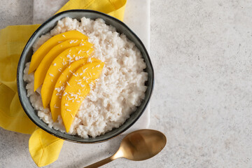fresh ripe mango and sticky rice with coconut milk, authentic Thai dessert