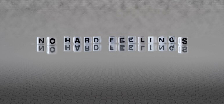 no hard feelings word or concept represented by black and white letter cubes on a grey horizon background stretching to infinity