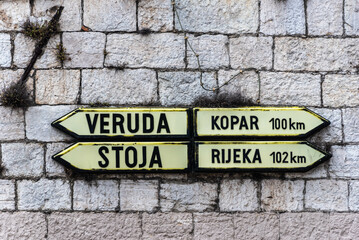 signpost to various directions in istria, croatia