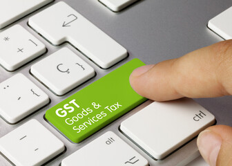 GST Goods and Services Tax - Inscription on Green Keyboard Key.