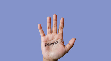 Word resprct written on hand isolated on blue background