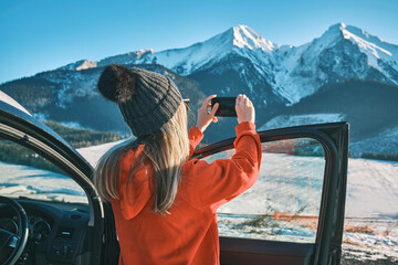 Woman travel exploring, enjoying the view of the mountains, landscape, lifestyle concept winter...