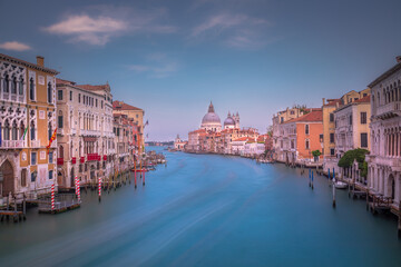 Grand Canal in Venice at sunrise, with Santa Maria della Salute Basilica, Italy