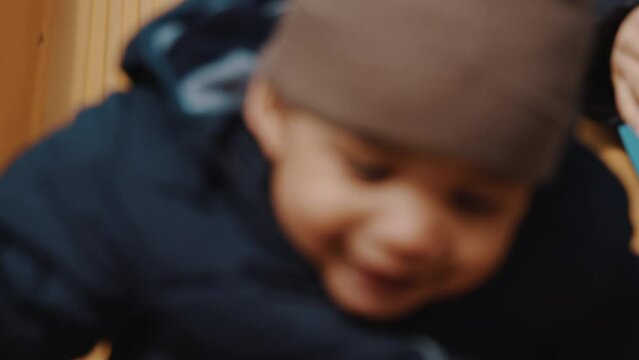 let's slide my little love - mom helping her toddler in sliding. High quality 4k footage