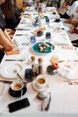 long table with food after dinner