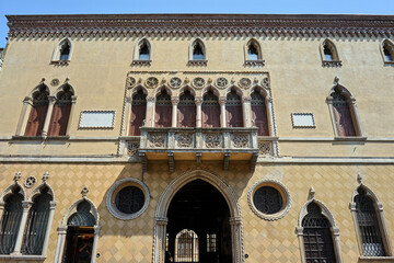 Fototapeta na wymiar facade of a historic townhouse with balcony and shutters in the city of Padua