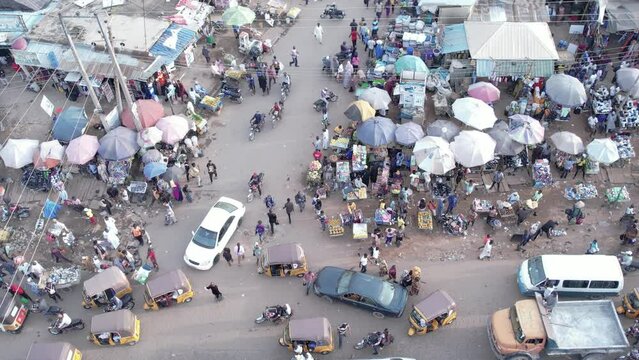 Drone shot of  Busy street, heavy traffic,Local market shopping  area,Africa congestion and  busy road in Africa