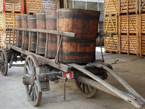 old wooden cart with wooden crates to hold wine