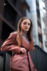 Fototapeta premium Beautiful model with long hair gazing outdoors