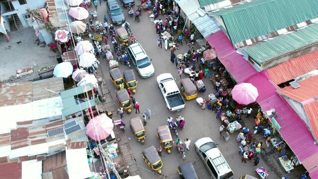 Drone shot of  Busy street, heavy traffic,Local market shopping  area,Africa congestion and  busy road in Africa