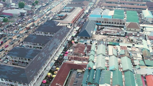 Drone shot of  Busy street, heavy traffic,Local market shopping  area,Africa congestion and  busy road in Africa