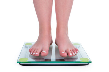 Slim caucasian girl standing barefoot on wheights isolated on white background