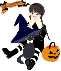 ハロウィンで魔女の仮装をした女の子と黒猫