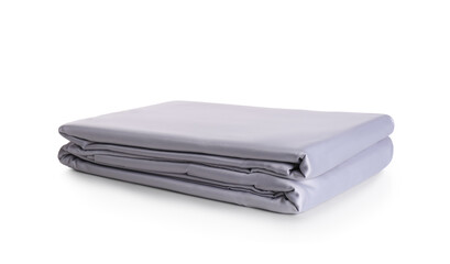 Stack of clean silky bed linen isolated on white