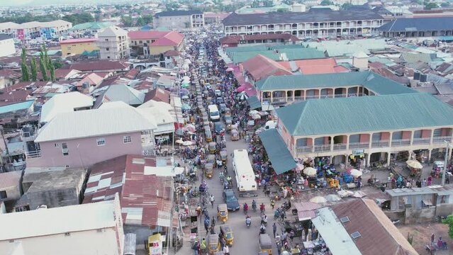 Drone shot of  Busy street, heavy traffic,Local market shopping  area,Africa congestion and  busy road in Africa