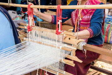 Weaving machine cotton fabric on natural background.