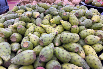 Heap of organic Prickly pears - Cactus fruits (tuna or higo chumbo in spanish) for sale in a supermarket fruit section