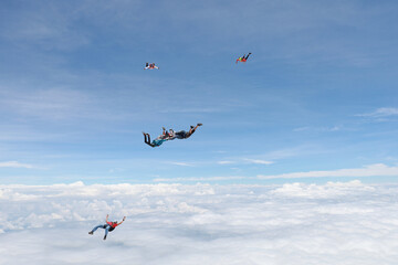 Obraz na płótnie Canvas Skydiving. Skydivers are in the sky.