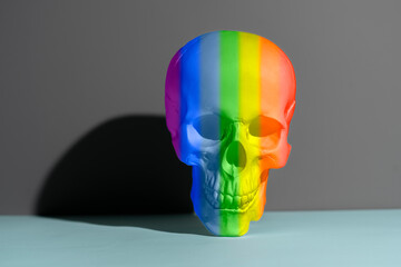 isolated human skull made of rainbow colors, symbol of halloween