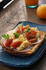 scrambled egg on toast, breakfast. 