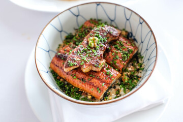 Grilled eel rice bowl with foie gras on top, unadon.