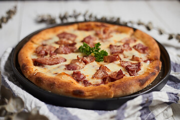 Homemade bacon and cheese pizza