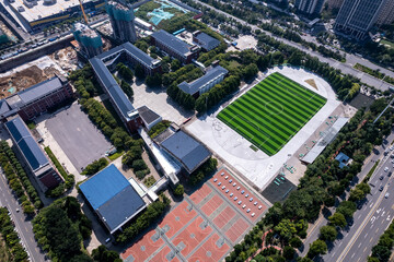 Aerial photography aerial view of Asian modern middle school campus building
