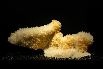 A detailed closeup of a beautiful cluster of glassy quartz crystal mineral stones.
