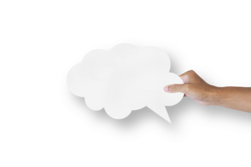 Hand holding a white paper cloud shape speech bubble balloon isolated on transparent background.