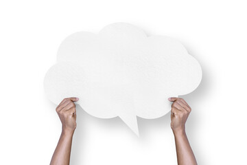Hand holding a white paper cloud shape speech bubble balloon isolated on transparent background.