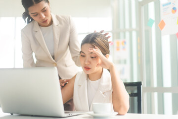 Business asian woman depressed or sad from workplace talking with friend for mental health...