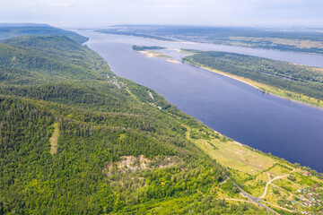 Fototapeta na wymiar Aerial view of Zhiguli mountains and Volga river on sunny summer day. Zhiguli Nature Reserve, Samara Oblast, Russia.