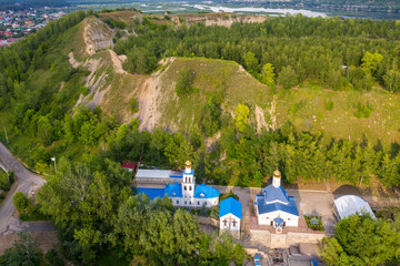 Aerial view of Church of the Icon of the Mother of God ’Neupivaemaya chasha” and Tsarev Kurgan. Volzhsky, Samara Oblast, Russia.